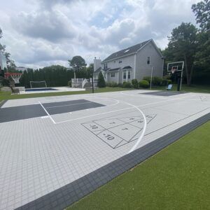 Basketball Sports Game Court Built With Mateflex Tiles On Poured Concrete Slab In Setauket Long Island NY