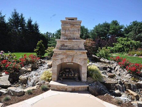 Custom-Fireplace-with-Natural-Rocks-Waterfalls