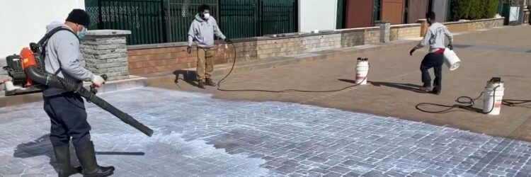 Spreading-the-access-sealer-from-the-pavers-surface-and-let-others-porous-pavers-absorb-and-avoiding-the-sealer-to-sit-in-lover-depressions-on-pavers-surface