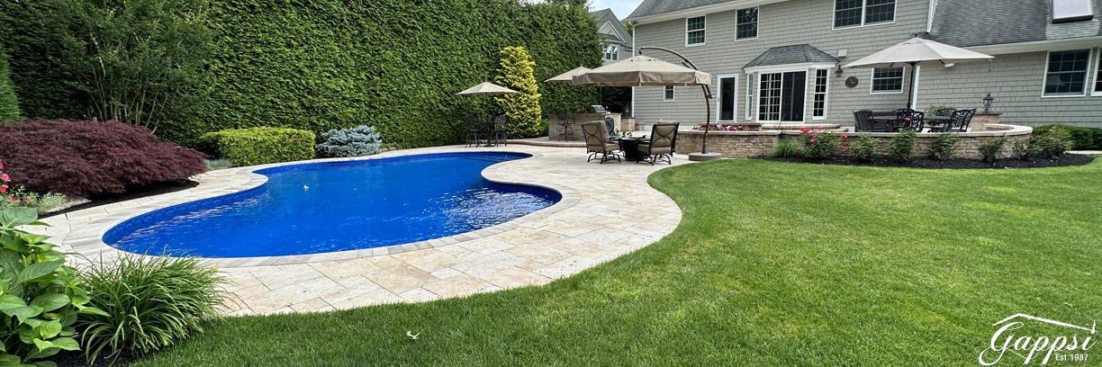 Free-Formed-Vinyl-Pool-and-Travertine-Patio-Installation-in-Smithtown2