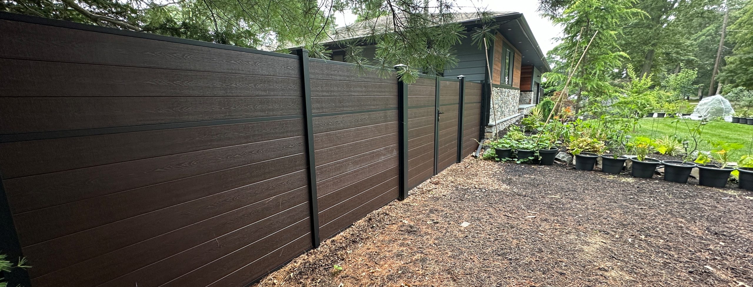 Aspen Brown Greenwood Fence