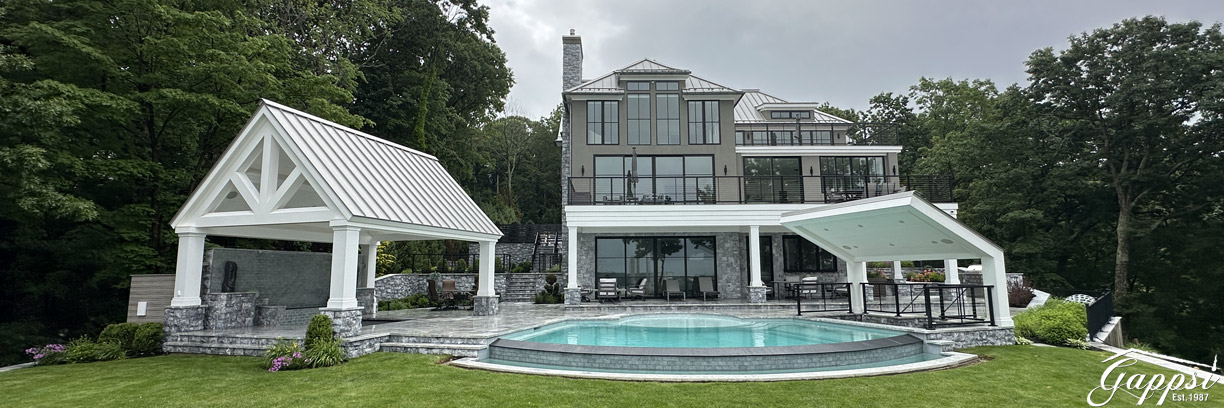 luxury-backyard-transformation-in-belle-terre-ny---custom-pools-fire-pits-and-outdoor-living-by-gappsi