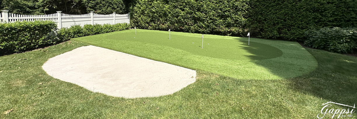 transforming-backyards-with-a-custom-putting-green-sports-game-court-in-dix-hills-ny
