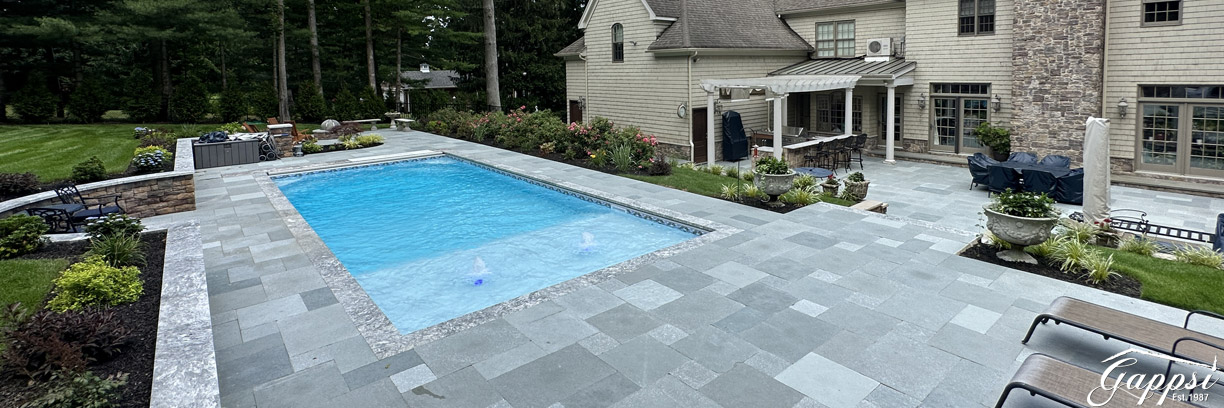 Natural Stone Pavers and Pool Coping Backyard Transformed