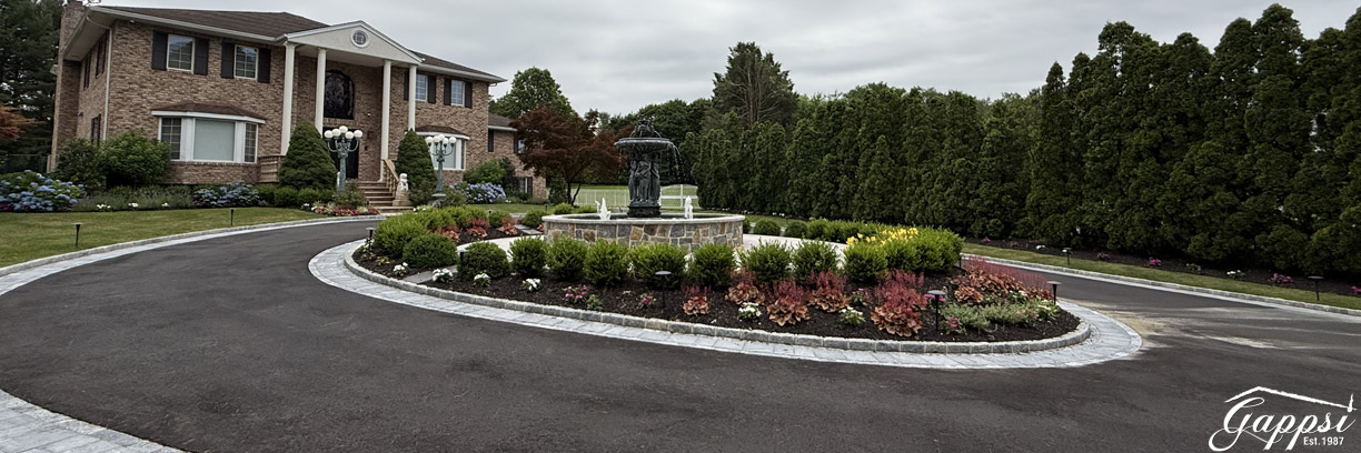 elegant-masonry-and-landscape-driveway-transformation-in-upper-brookville-ny4