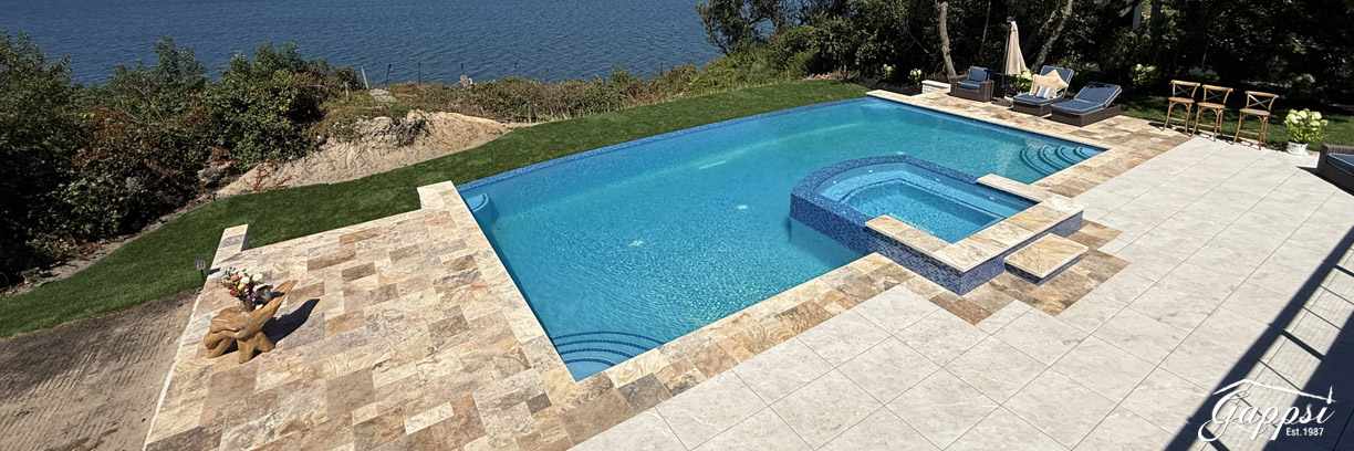 custom infinity pool, travertine patio, or complete backyard renovation,