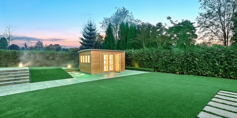 A professionally installed modern wood sauna in a Long Island backyard.