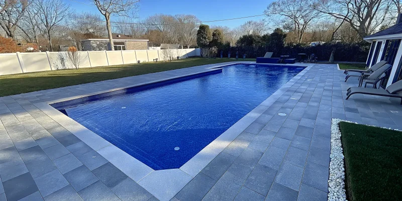 Custom gunite pool and patio designed by professional Long Island, NY builders.