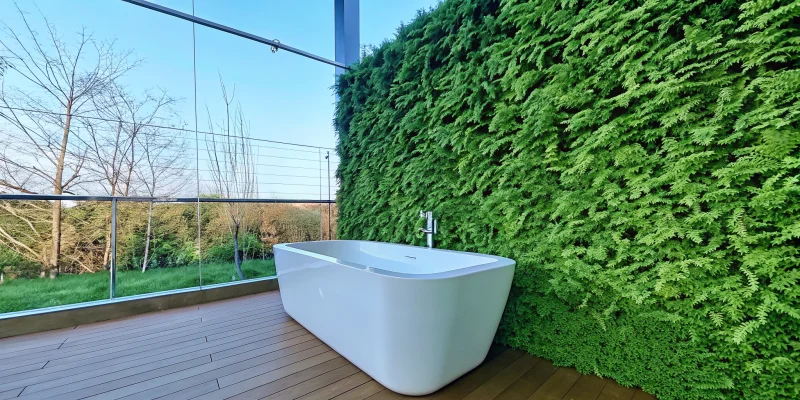 A modern bathroom renovation with a freestanding tub, the result of hiring local services.