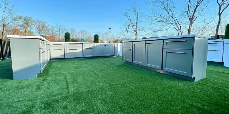Serene outdoor kitchen cabinets on display at a Long Island dealer showroom.