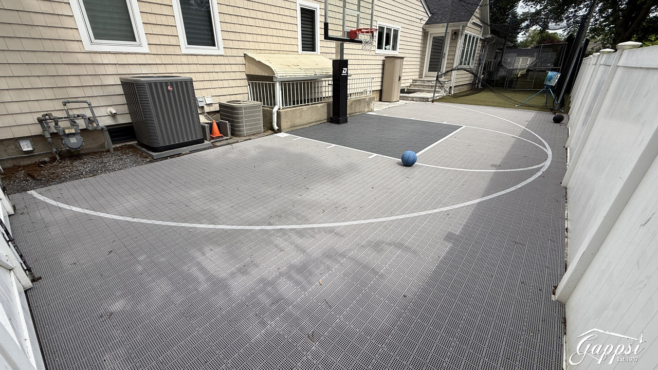 integrated-backyard-batting-cage-and-basketball-court-combo-by-gappsi