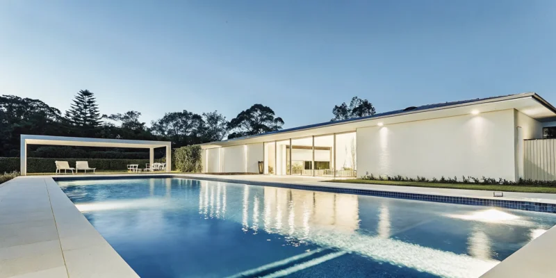 Custom swimming pool and backyard patio by East West Pools, a Gappsi Group division.