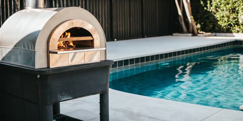 Clementi Gas Gold oven making homemade pizza with pro performance and the convenience of gas.