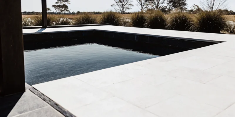 Gunite swimming pool with a smooth marble dust finish