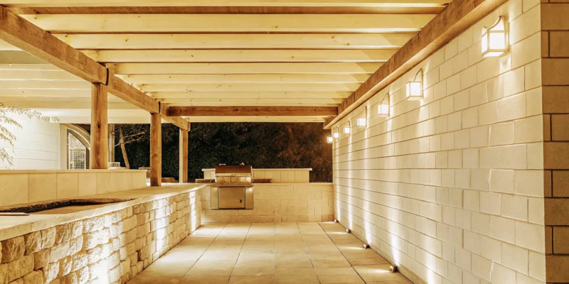 outdoor kitchen near me layout with stone counters in a Long Island backyard