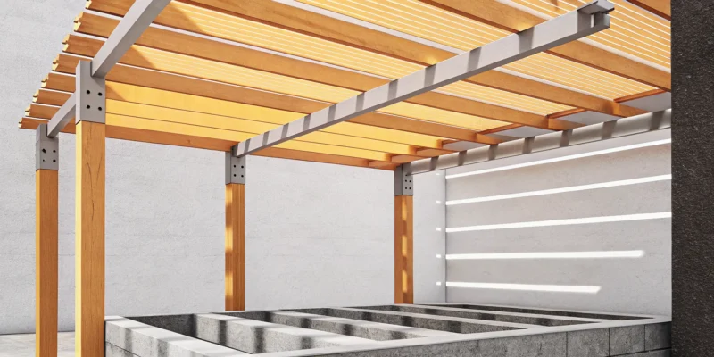 A modern wooden pergola with an open roof, a final result of a pergola design project.