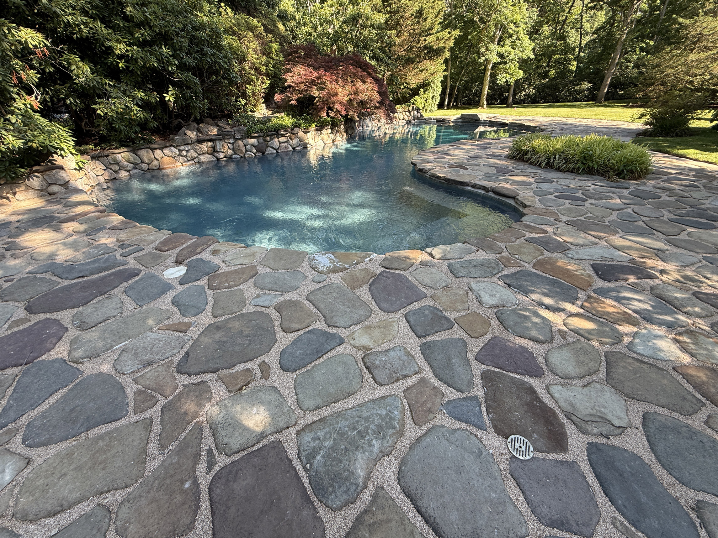 resin-bond-stone-joint-restoration-for-a-natural-pool-patio-in-setauket