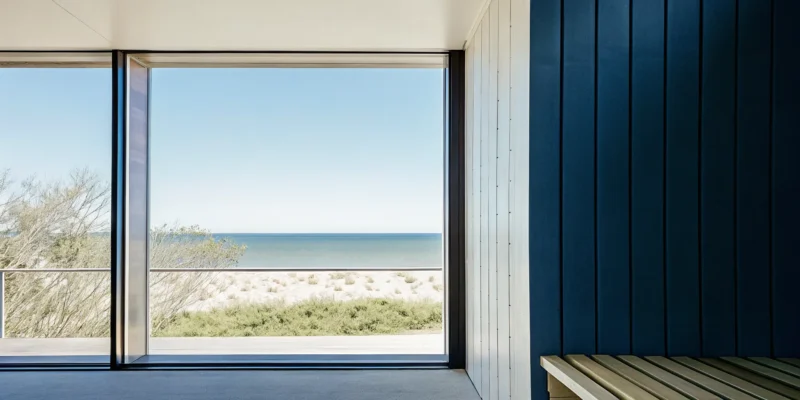 Indoor sauna installation in a modern Long Island home with a beach view.