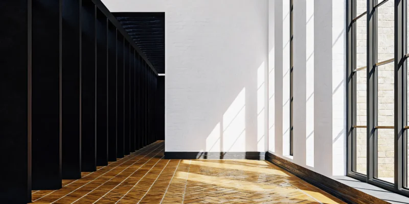 Red brick floor laid in a classic herringbone pattern in a modern home.