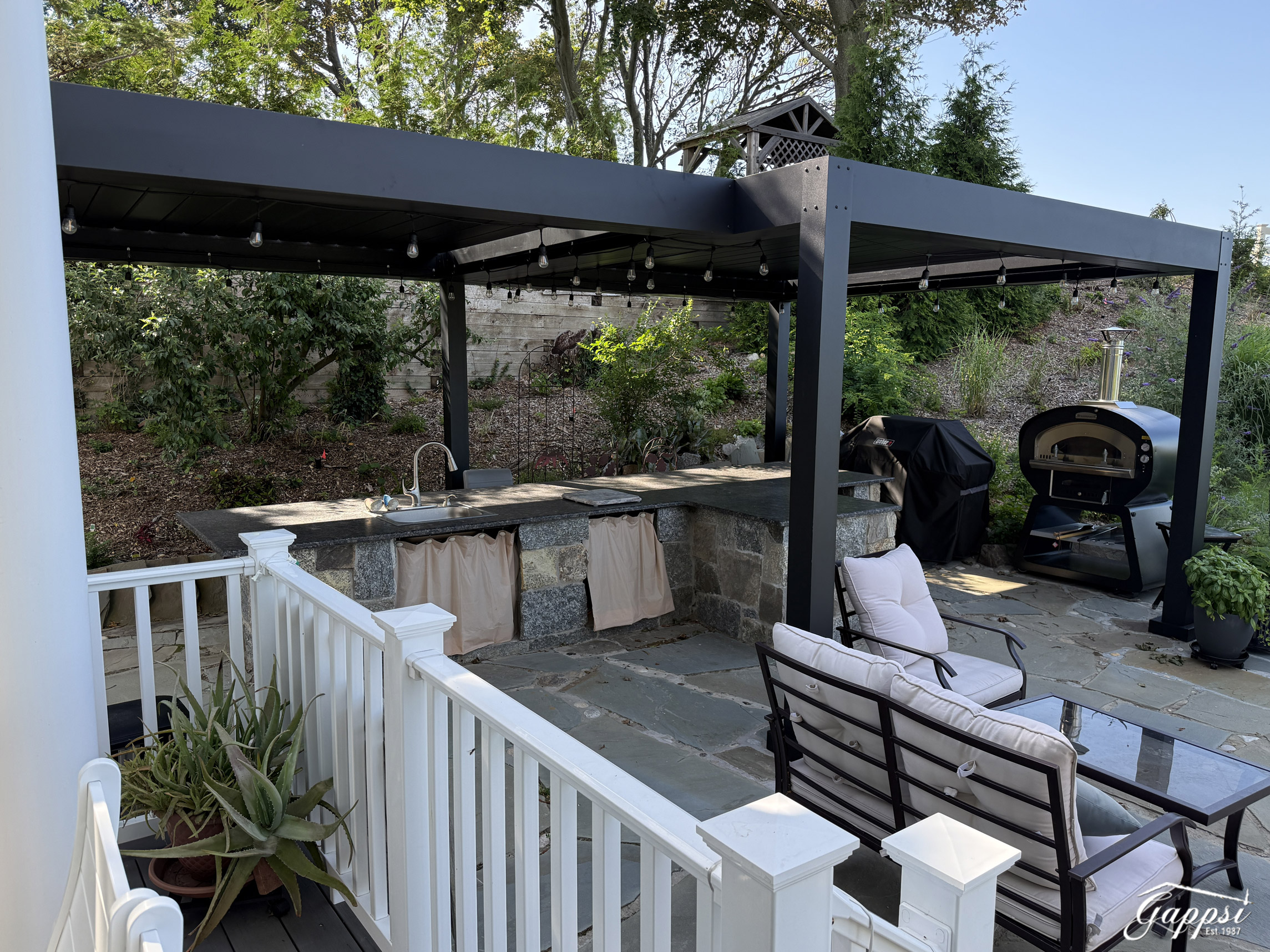 louvered-pergola-with-wood-burning-pizza-oven-in-rocky-point-ny